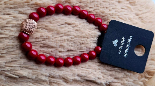 Raudonas akmuo amuletas 8mm/